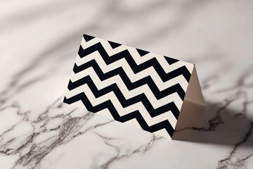 Minimalist Black and White Card Showcasing Zigzag Patterns on Marble Surface Generative AI