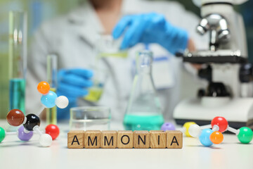 A scientist is carefully handling ammonia samples under a microscope in a vibrant, colorful lab...