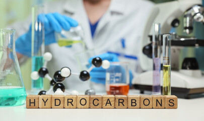 In a laboratory setting, researchers explore hydrocarbons using advanced equipment and detailed...