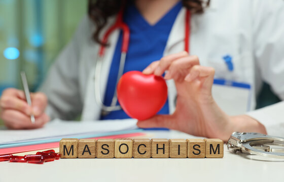 A dedicated medical professional holds a heart symbol for care, with masochism spelled out nearby