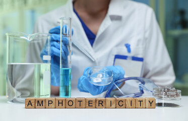 An engaging lab scene demonstrating the concept of amphotericity using various chemicals and...