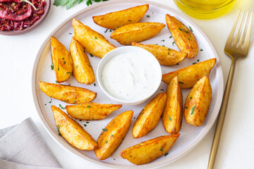 Baked potato with white sauce. Healthy food. Vegetarian food.