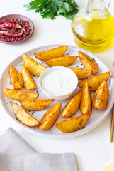 Baked potato with white sauce. Healthy food. Vegetarian food.
