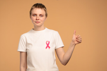 Woman Wearing Pink Ribbon for Breast Cancer Awareness