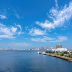 Waterfront cityscape under a vibrant blue sky