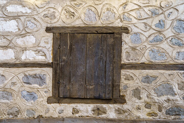 Wall with typical window, in Bansko,