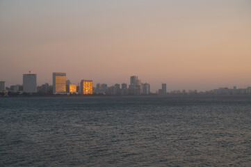 Juhu beach and skyline of Mumbai, India, travel destination in Asia, tropical west coast, Arabian...
