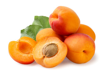 Pile of ripe apricots with leaves close-up on a white background. Isolated