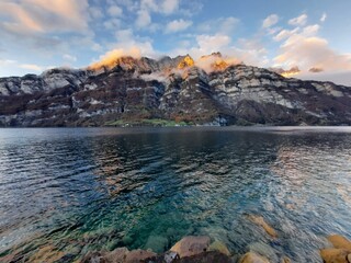stunning sunset over lakeside mountains