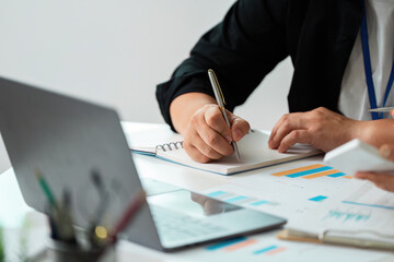 Business Collaboration. Professionals discussing financial data in a meeting.