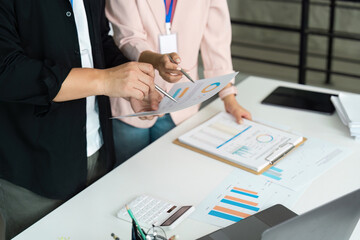 Business Collaboration. Professionals analyzing financial reports and data in a modern office.