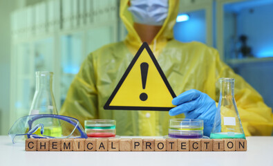 A lab professional highlights the importance of chemical safety with protective gear and clear...