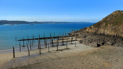 Gwin Zegal tree trunk port in Plouha, Cotes d'armor, Brittany, France. Ancient harbor sheltered in...