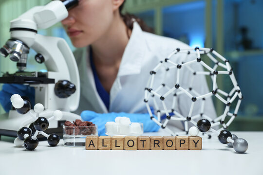 A scientist is thoroughly examining molecular structures that are related to the concept of allotropy in a lab setting