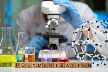 This text explores and analyzes various polymerization processes using specialized lab equipment...