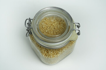Overhead View of Organic Puffed Grain in a Glass Jar