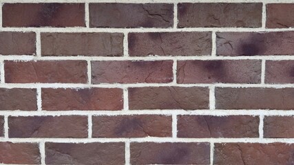 Red brick wall with white mortar and horizontal layout as background for architectural or design content