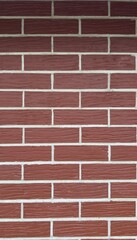 Red decorative brick wall with clear horizontal masonry and light mortar joints — versatile...