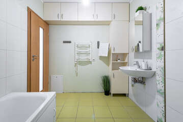 Modern Bathroom Interior With White Fixtures and Neutral Tones