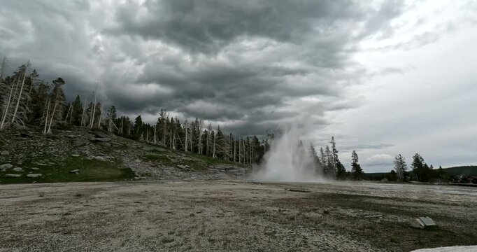 Grand Geyser begins to rumble and erupt in Yellowstone National Park. 4K stock footage of the tallest predictable geyser in the world.