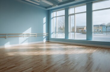 Bright and Spacious Dance Studio Featuring Wooden Flooring, Light Blue Walls, and Wall-Mounted Barre