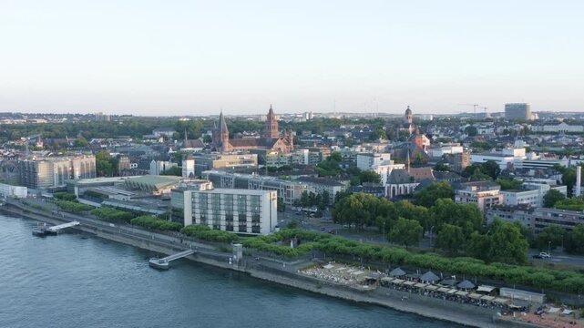 Aerial drone View of Mainz ship Rhine River, Castle, dom, Theodor Heuss Bridge and Cityscape at Sunset Germany 4k flight away