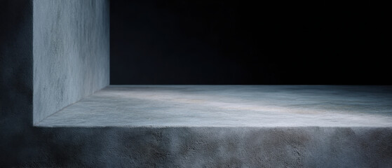 Minimalist concrete platform with single column in dim lighting