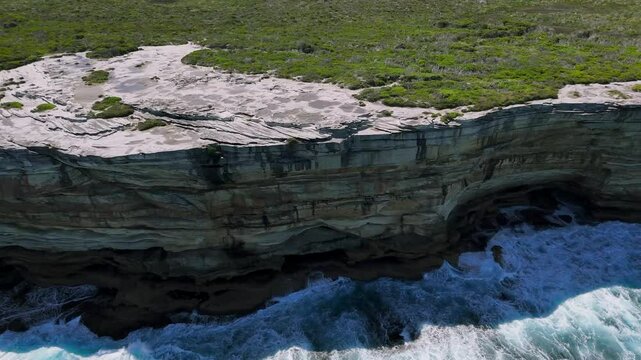 Kurnell, Sydney, Australia -UHD Video: Flying over Cape Bailey Track on the scenic Kamay National Park coastline with panoramic ocean views.