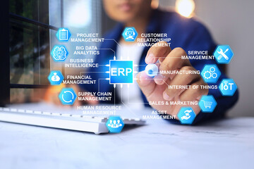ERP concept with businessman working on enterprise resource planning to manage relate factor raw...