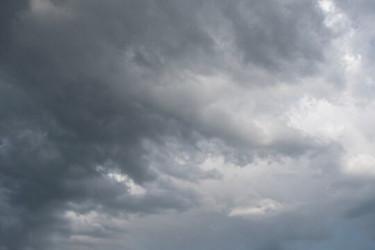 The sky is covered with grey rain clouds