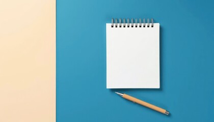 Blank notepad and pen on a two-toned background