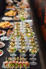 An Elegant Assortment of Gourmet Desserts and Savory Snacks Beautifully Arranged on Table