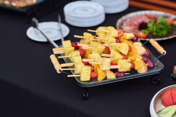 An Elegant and Colorful Fruit Platter Featuring a Variety of Exquisite Exotic Fruits