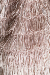 Texture of a fringed skirt