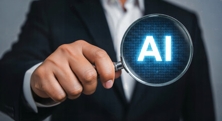 Businessman Analyzing AI Binary Data Concept. Magnifying Glass Focus on Artificial Intelligence,AI-Based Business Decision Analysis for 2026 ,AI -Powered business transformation in 2026 .