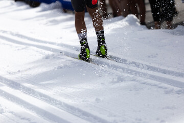 Athlete Skiing on Snowy Tracks During a Winter Competition