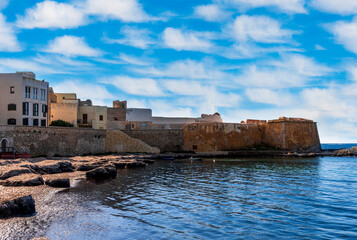 beautiful blue landscape of sea coast embarkment in a city with beach and mediterraneran buildings...