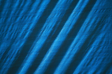 blue texture, abstract background, plastic tarp, tarpaulin, diagonal lines, pattern, fabric...