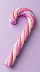 A delightful twisted candy cane with pink white and purple colors on a soft purple background