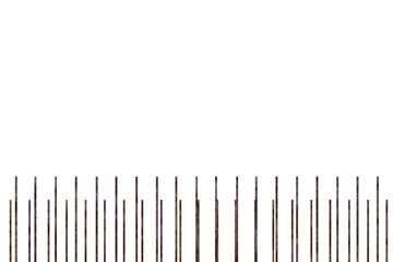 irregular line of vertical, textured, multicolored columns of varying heights, suggesting a...