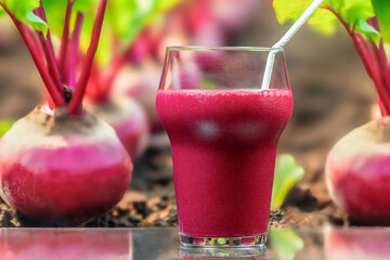 Beetroot smoothie on a blurred crop background
