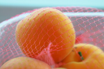 apricots, fruit, mesh bag, close-up, macro, ripe, orange, summer, fresh, healthy, texture, natural,...