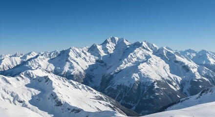 Naklejka premium Majestic Snow-Covered Mountains Under Clear Blue Sky