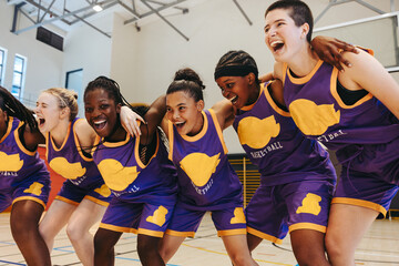 Strength and unity: Diverse women athletes celebrate a championship win