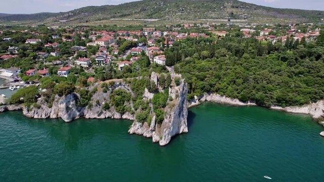 Italian Historical Castle, Castle Duino, bright sunny day, European historic castle, drone UHD shot
