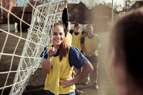 Teenage girls soccer practice on outdoor field