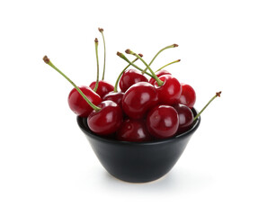 Many fresh ripe cherries in bowl isolated on white