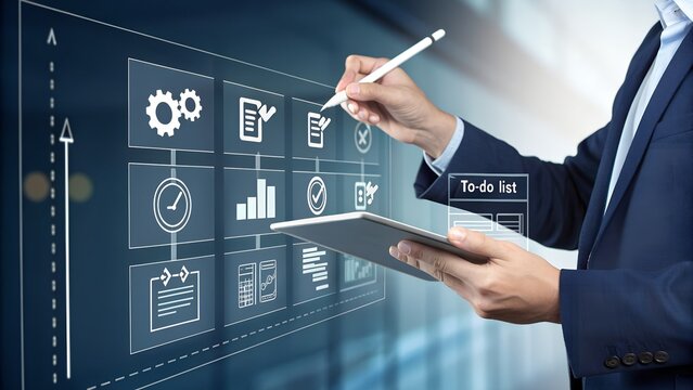 A business professional uses a stylus and tablet to interact with a virtual screen, managing digital processes, analyzing data, and planning tasks efficiently. - Powered by Adobe