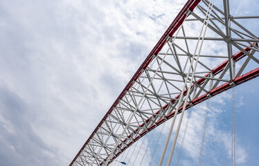 steel beams is bolted down. Close-up shows the connection of the metal powerful straight crossbar,...