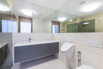 Modern Bathroom Interior with Mirrors and Minimalist Design Elements